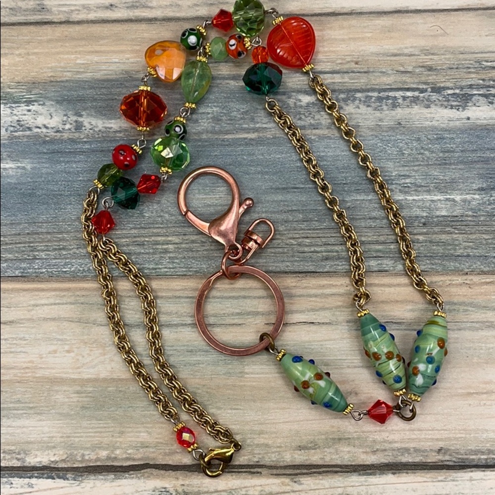 ⭐️Adorned Crown assemblage orange green bead lanyard keychain badge